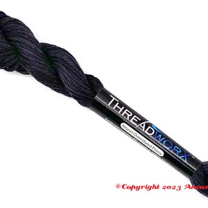 May include: A spool of black hand-overdyed floss with the text "THREADWORX" and "Hand Overdyed Floss" on the label.