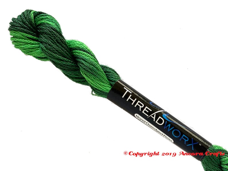 ThreadworX 11611 Variegated Embroidery Floss Tropical thread has a repeating gradient of stunning tropical and forest greens and is used for cross stitch, embroidery, needlepoint, making friendship bracelets, and other crafts.