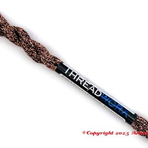 May include: A spool of brown and copper-colored thread with the text "THREAD WORK" on the label. The thread is tightly wound and has a metallic sheen. The copyright notice is visible at the bottom.