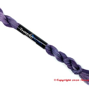 ThreadworX 1129 Variegated Embroidery Floss Merlot thread has a repeating gradient of dusky medium and dark purples and is used for cross stitch, embroidery, needlepoint, making friendship bracelets, and other crafts.