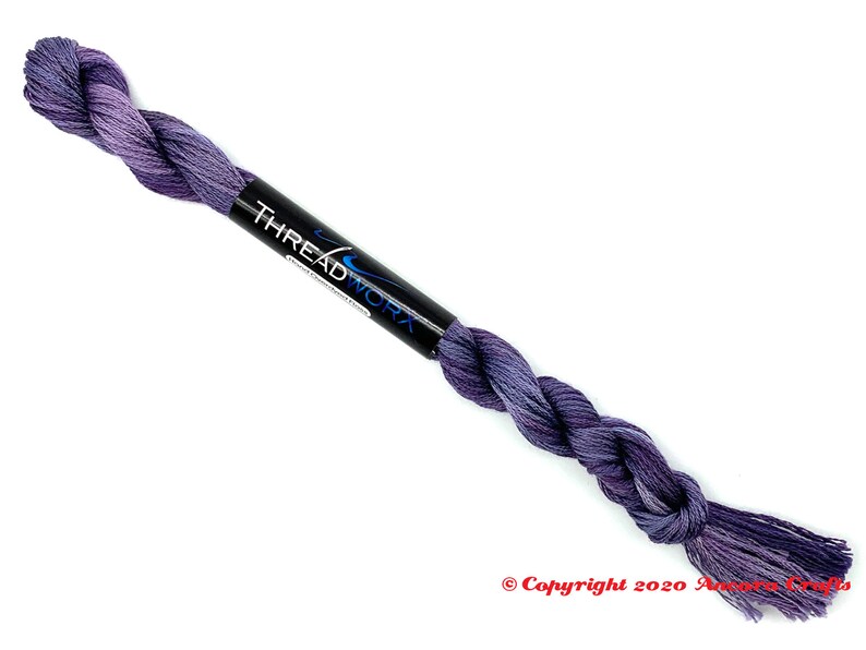 ThreadworX 1129 Variegated Embroidery Floss Merlot thread has a repeating gradient of dusky medium and dark purples and is used for cross stitch, embroidery, needlepoint, making friendship bracelets, and other crafts.