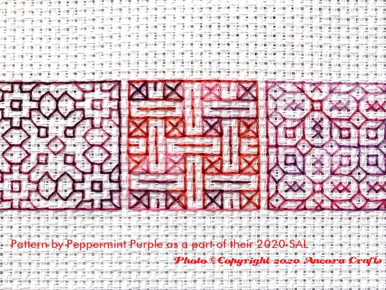 ThreadworX 1096 Variegated Embroidery Floss Renaissance thread has a repeating gradient of dark corals, pink, and red-purple and is shown here stitched in a geometric blackwork embroidery pattern created by Peppermint Purple.
