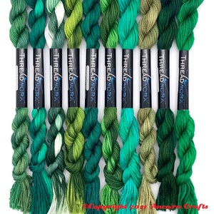 This collection of ten bright green ThreadworX embroidery threads have repeating gradients of greens varying from nearly aqua to olive green. These are used for cross stitch, embroidery, needlepoint, making friendship bracelets, and other crafts.
