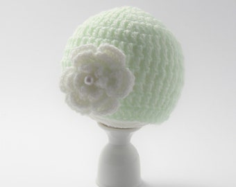 Newborn baby hat in green with a white crochet flower with a pearl attached, Handmade crochet beanie hat 0 -  months