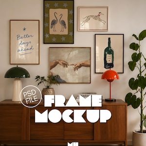 May include: A gallery wall arrangement featuring five framed art prints above a wooden sideboard. The prints include text reading Better days ahead, two cranes, a running dog, a depiction of hands reaching, and a green bottle illustration.