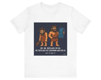 May include: White t-shirt with a pixelated graphic of two cavemen. One holds a club, the other a tablet with "AI". Text on the shirt: "ME NO REPLACE BY AI. ME REPLACE BY CAVEMAN WHO USE AI. LET IT BE IT."