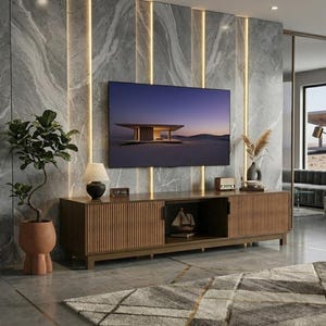May include: A contemporary living room with a large TV on a marble feature wall with vertical lights. A wooden media unit with a ribbed design displays ornaments. A potted plant and a patterned rug add to the modern decor.