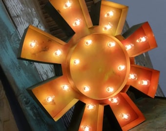 Vintage style metal sun marquee light, weathered finish