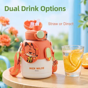 May include: An orange and white water bottle with a cartoon fox design, a straw, and the text "Dual Drink Options" and "Straw or Direct". The bottle has a carrying strap and a glass of water with orange slices.