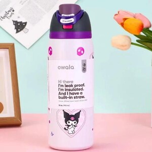 May include: A white and purple Owala water bottle with a black and purple lid. The bottle has a cartoon design and the text "Hi there I'm leak proof. I'm insulated. And I have a built-in straw." The bottle holds 946 ml.
