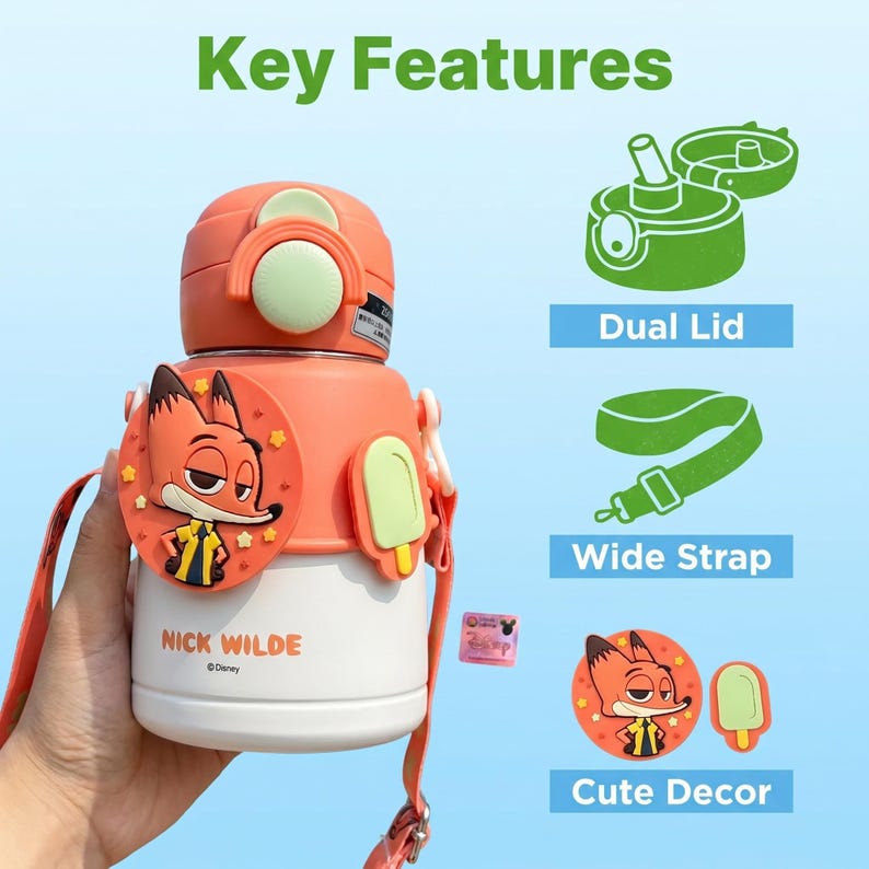 May include: An orange and white water bottle featuring a cartoon fox character. The bottle has a dual lid, a wide strap, and cute decorative elements. The text "Key Features" is at the top of the image.