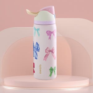 May include: A light pink Owala water bottle featuring a bow pattern in pastel shades. The bottle has a pink, white, and yellow lid with a straw. The word "owala" is printed on the bottle. This insulated bottle is designed for hydration.