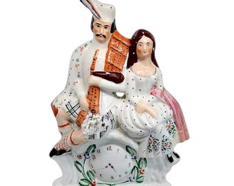 1860's Large Antique English Staffordshire Pottery Flatback Figural Group of a Scottish Couple and Clock