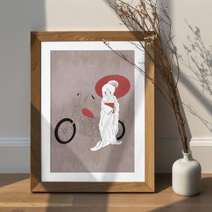 May include: A framed art print featuring a line drawing of a person in a white kimono standing next to a motorcycle. The person holds a large red parasol. The background is a muted taupe color, and the motorcycle has a red fuel tank.