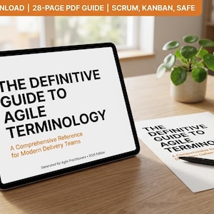 May include: A digital guide titled "The Definitive Guide to Agile Terminology" displayed on a tablet and a printed page. The guide is a comprehensive reference for modern delivery teams. A coffee mug and a small plant are also on the wooden table.
