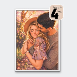 Puede incluir: Una impresión artística enmarcada muestra a una pareja abrazándose. La mujer lleva un vestido floral y un sombrero, el hombre un suéter gris. El fondo presenta un paisaje suave y borroso con tonos cálidos. El texto en la imagen dice "Ready in 4 Hrs."