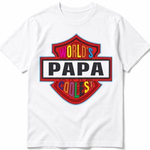 Peut inclure: T-shirt blanc avec un motif coloré en forme d'écusson. Le texte "WORLD'S PAPA COOLEST" est inscrit en plusieurs couleurs vives. Le t-shirt est en matière douce, idéal pour un usage quotidien.