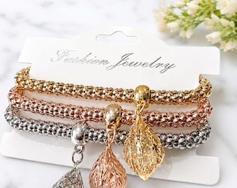Tri-Tone Leaf Charm Bracelet Set – Gold, Rose Gold, Silver Stretch Bangles