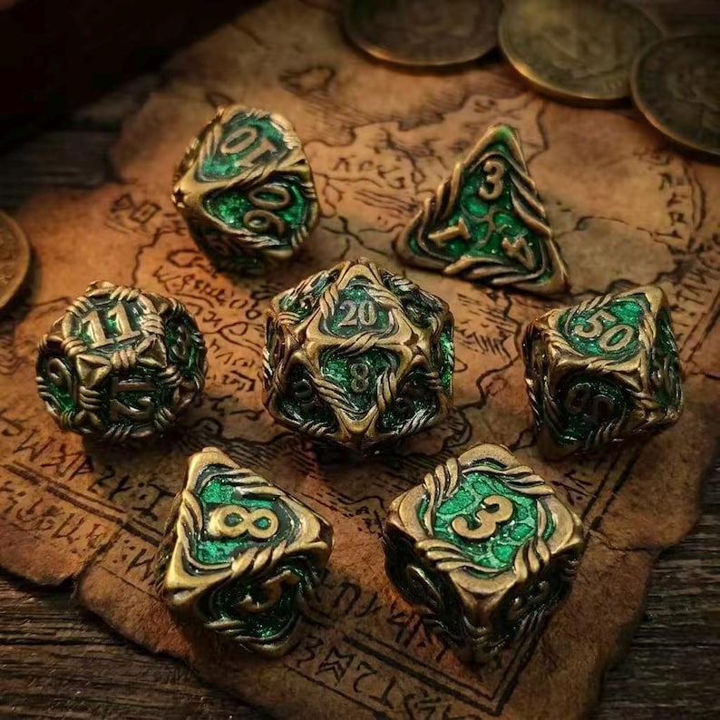 May include: Set of seven antique-style dice in various shapes, including a d20, d10, and d4. The dice are bronze-colored with green accents and numbers. They are arranged on a vintage map with coins in the background.