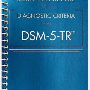 May include: A blue spiral-bound book titled Desk Reference to the Diagnostic Criteria from DSM-5-TR. The cover features white text with horizontal lines above and below the title, and a white spiral binding along the left edge of the book.