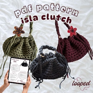 May include: Three crocheted clutches in olive green, dark charcoal, and deep burgundy, each with a braided handle, drawstring closure, and a floral accent. A digital tablet displays the Isla clutch PDF pattern text and instructions.