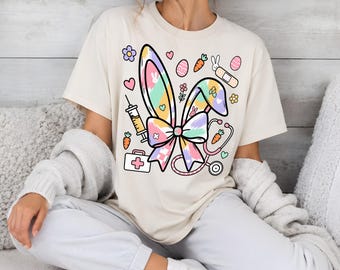 Oster-Krankenschwester-PNG-Sublimationsdesign, Pastell-Hasenohren mit koketter Schleife (DTF-Download), süßes Stethoskop-Frühlings-Shirt-Design