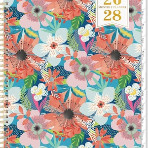 May include: A spiral-bound monthly planner with a vibrant floral design. The cover features a teal background with large flowers in shades of pink, orange, and white. The planner includes the text "26 MONTHLY PLANNER 28".
