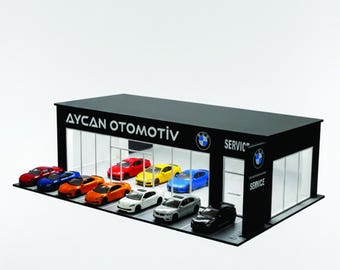 Diorama de sala de exposición a escala 1:64 con iluminación LED, exhibición de modelos realistas y logotipo personalizado.