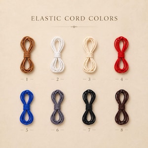 Pode incluir: Oito pacotes de cord&atilde;o el&aacute;stico dispostos em duas filas, numerados de 1 a 8. As cores incluem castanho, branco, creme, vermelho, azul, cinzento, preto e castanho escuro. O texto ELASTIC CORD COLORS est&aacute; centrado no topo da imagem.