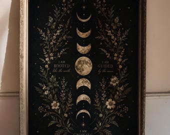 May include: A framed rectangular wall art print featuring a vertical sequence of moon phases centered on a dark background. The design includes botanical illustrations of flowers and leaves, with the text I AM ROOTED like the earth, I AM GUIDED by the moon, and I AM GROWING through every phase.