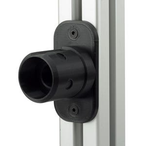 May include: A black 3D-printed cylindrical mount with a hollow center and a rounded rectangular base plate. The mount is secured to a vertical silver aluminum extrusion profile using two black hex bolts positioned at the top and bottom.