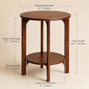 Peut inclure: Une table d'appoint ronde en bois brun avec une &eacute;tag&egrave;re inf&eacute;rieure. Les dimensions indiqu&eacute;es sont : diam&egrave;tre du plateau 43 cm, hauteur de l'&eacute;tag&egrave;re 39,5 cm, garde au sol 12,7 cm, hauteur totale 55,5 cm et diam&egrave;tre de l'&eacute;tag&egrave;re 33 cm.