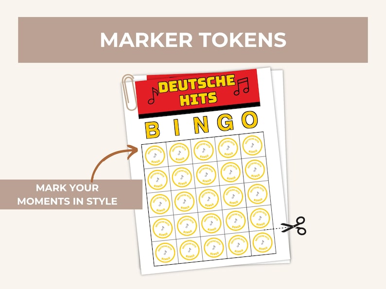 May include: A printed bingo game sheet titled "DEUTSCHE HITS BINGO" with yellow circles and musical notes. The text "MARKER TOKENS" is at the top, and "MARK YOUR MOMENTS IN STYLE" is at the bottom. A paperclip and scissors are also visible.