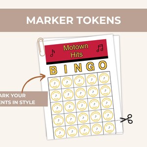 May include: A stack of Motown Hits Bingo cards with a red and black header. The cards have a grid of yellow circles with musical notes. The text "MARKER TOKENS" is at the top, and "MARK YOUR MOMENTS IN STYLE" is on the left. A paper clip and scissors are also visible.
