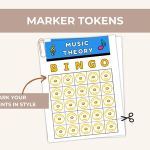 May include: A sheet of Music Theory Bingo cards with a blue header and yellow text. The cards are held together with a silver paper clip. The text "MARKER TOKENS" is at the top. The text "MARK YOUR MOMENTS IN STYLE" is on the left.