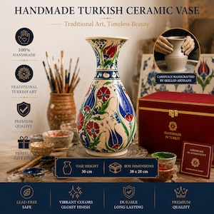 May include: A handmade Turkish ceramic vase with a cream base, featuring hand-painted red and blue tulip motifs with green leaves. The vase stands 30 cm tall and is displayed with a red box measuring 38 x 20 cm, a certificate of authenticity, and various paintbrushes.