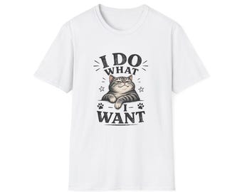 May include: White t-shirt featuring a graphic of a gray tabby cat with the text "I DO WHAT I WANT". The cat is smiling and has its paws crossed. The design includes stars and paw prints.