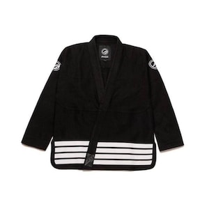 May include: Black martial arts uniform with white stripes on the bottom. The uniform has a wrap-around closure and a logo on the chest and sleeves. The uniform is designed for martial arts training and competition.
