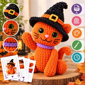 Könnte beinhalten: Ein gehäkeltes orangefarbenes Katzen-Plüschtier mit einem schwarzen Hexenhut, der ein orangefarbenes Band und eine gelbe Schnalle hat. Die Katze hat große grüne Augen, eine rosa Nase und ein violettes Halsband. Inklusive Anleitungen und Dateisymbolen.