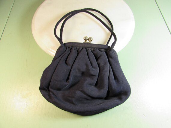 navy evening bag with strap