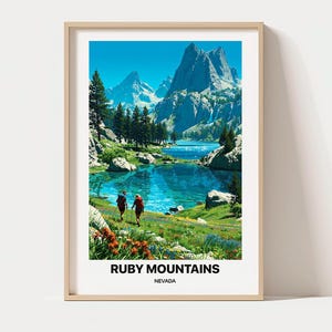 May include: A framed travel poster featuring a landscape of the Ruby Mountains in Nevada. The scene depicts two hikers walking through a wildflower meadow toward a turquoise lake surrounded by tall, jagged, snow-capped peaks and pine trees.
