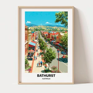 May include: A framed travel poster depicting a street scene in Bathurst, Australia. The illustration features a sunny town center with red brick buildings, green trees, pedestrians on the sidewalk, and distant hills under a bright blue sky.