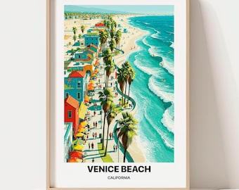 May include: A framed art print depicting a coastal scene at Venice Beach, California. The illustration features colorful buildings, palm trees, a sandy beach, and turquoise ocean waves. The text VENICE BEACH CALIFORNIA is printed at the bottom.