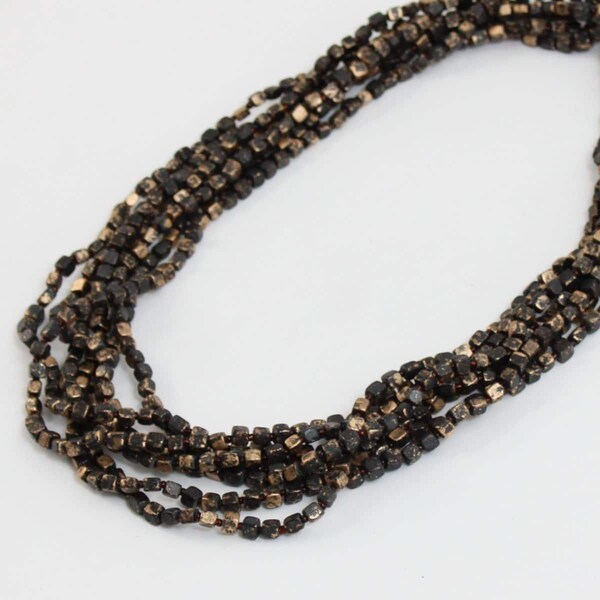 Multistrand Necklace with Beads and Metal Pendants