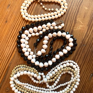 Multi strand black and white plastic beads, necklaces-your choice