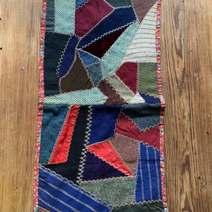 Vintage hand made crazy quilt runner, red floral feedesack back 30&quot; x 15&quot;