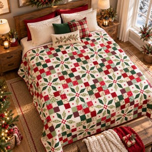 May include: A quilt featuring a repeating star pattern in red, green, and white. The bedding is layered with red, white, and green pillows, including a rectangular lumbar pillow with a pine branch print, set on a wooden bed frame.