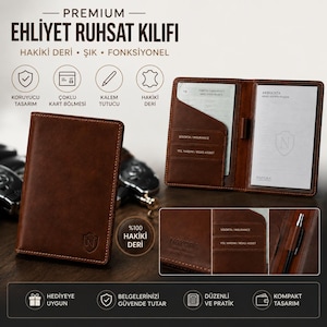May include: A brown leather document holder for vehicle registration and insurance papers. The cover features a small shield logo with the letter N. The interior includes clear plastic sleeves, card slots, and a pen loop. Text includes PREMIUM EHLIYET RUHSAT KILIFI, HAKIKI DERI, and NAYORA.