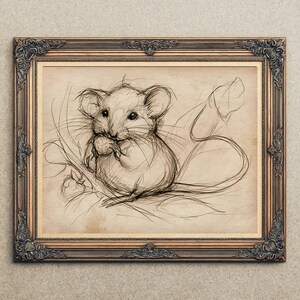 May include: A framed pencil sketch of a mouse, rendered in shades of gray and brown. The mouse is depicted in a seated position, holding a small object. The frame is ornate, with a dark brown finish.