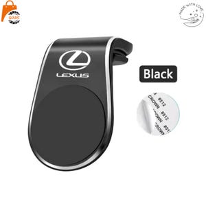 Puede incluir: Soporte negro para teléfono de coche con el logotipo de Lexus. El soporte tiene una superficie magnética y un borde plateado. La palabra "Black" se muestra en un rectángulo negro. También se incluye una pegatina redonda.